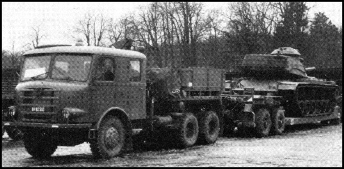 Heavy Tank Transport System in action with loaded M60 medium battle tank
