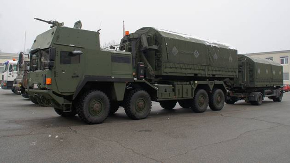 Roll-on/roll-off container handling system based on MAN HX 38.440 chassis with armored cab and weapons station (photo courtesy Austrian Army)